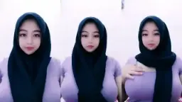 Ukhti Fira Berhijab Dengan Gaung Ungu Yang Menggoda