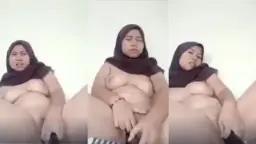 Gadis Berjilbab Coklat Menggoda Dengan Terong